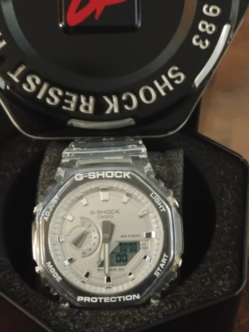 G-Shock Clear Resin Watch with White Dial and Silver Accents